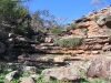 Peter stands part-way up the natural amphitheatre at Store Creek, Cocoparra Ntl Pk