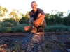 Peter perched atop another colourful piece of Pilbara rock