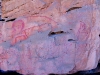 Faint art near falls.  Includes painting of snake