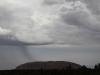 5.56pm.  Is it raining on the rock? We worked out that - no - the rain was the far side of Uluru.