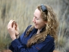 AWC Wildlife Ecologist Dr Leah Kemp admires a Smooth Knob-tailed Gecko.