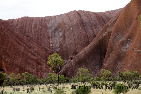 A few trickles and silvery patches on Uluru after drizzle