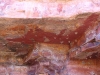 Large, deep ochre image of crocodile at the site.
