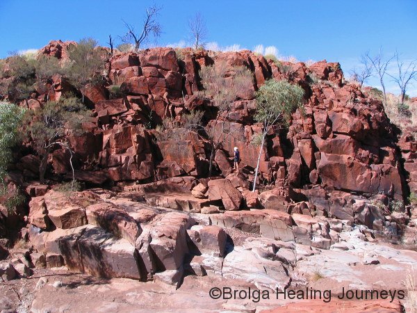 There are petroglyphs on most of these rock faces.